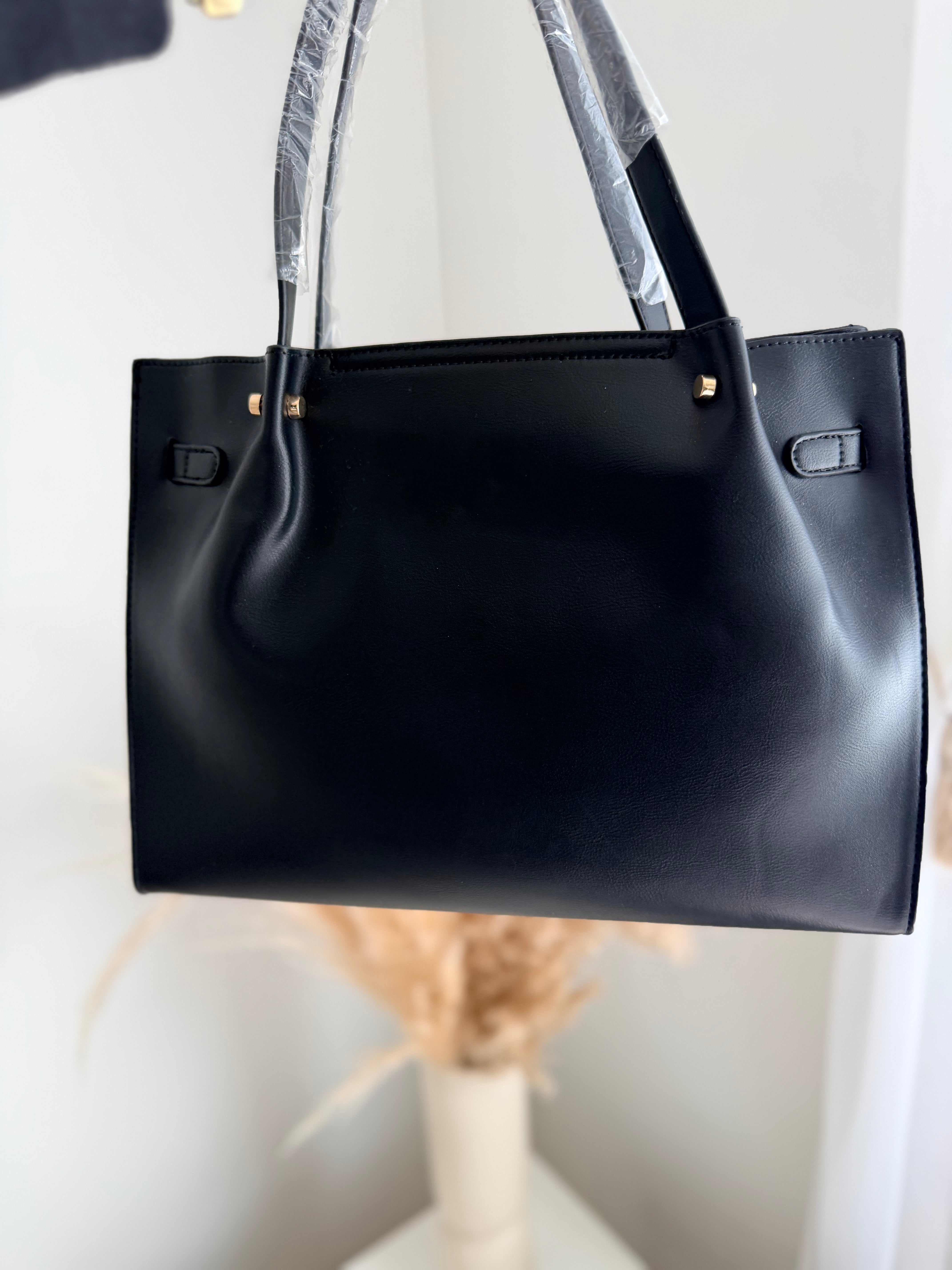 Sac noir détails dorés