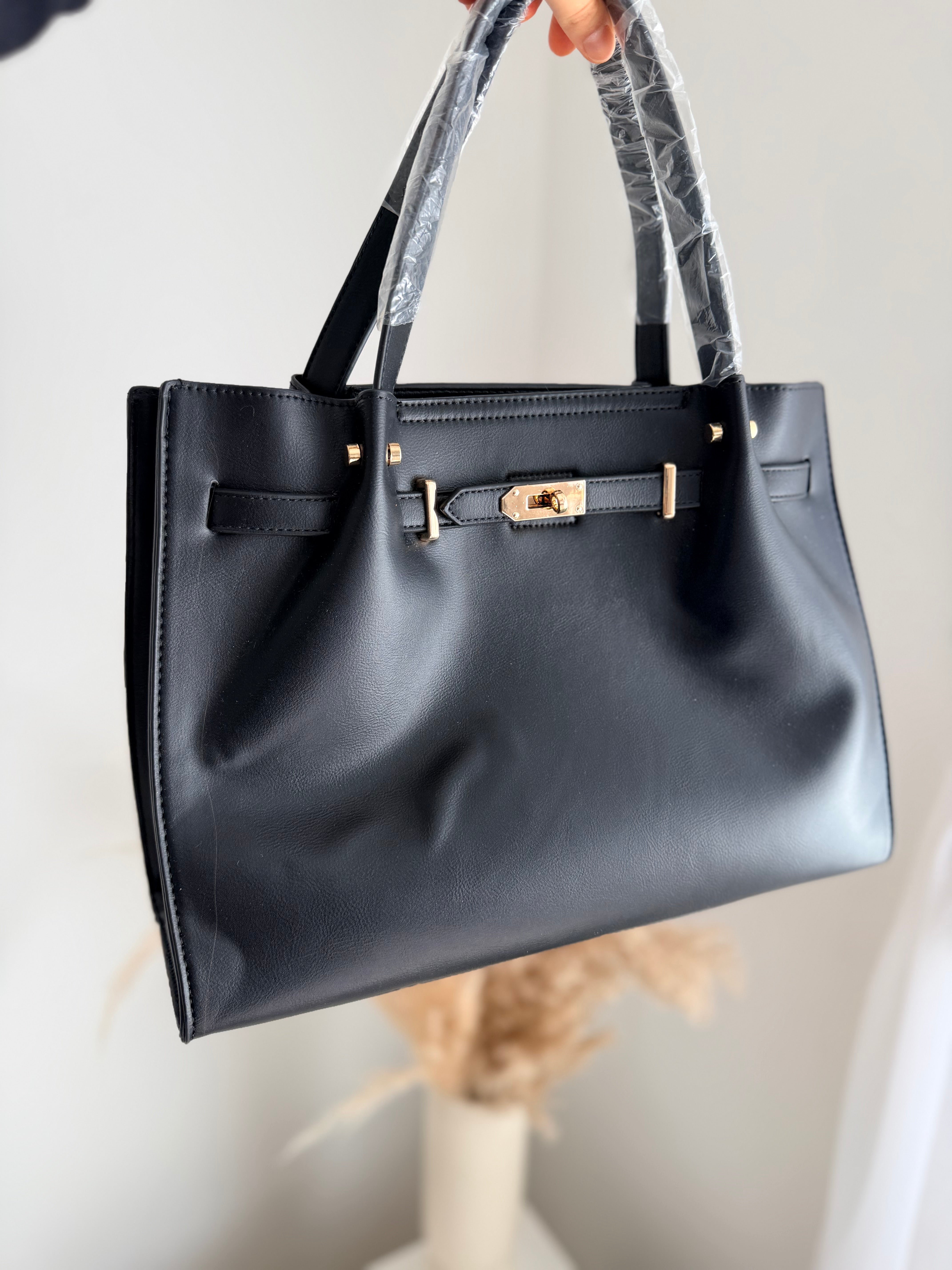 Sac noir détails dorés
